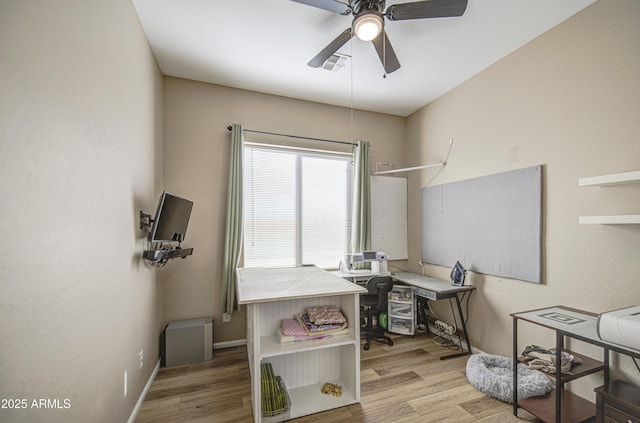 25659 W Forest Grove Ave, Buckeye, AZ 85326 - office featuring a ceiling fan, light wood-type flooring, and baseboards