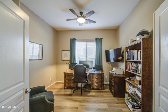 25659 W Forest Grove Ave, Buckeye, AZ 85326 - office with a ceiling fan, light wood-type flooring, and baseboards