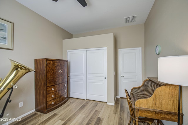 25659 W Forest Grove Ave, Buckeye, AZ 85326 - living area featuring light wood finished floors, baseboards, and a ceiling fan