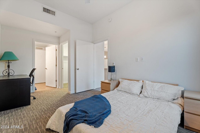 bedroom with light carpet