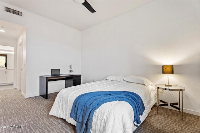 carpeted bedroom with baseboards, ceiling fan, and visible vents