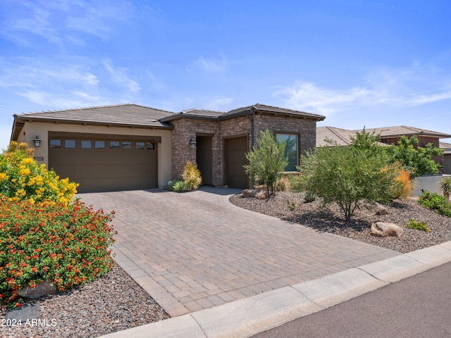 view of front of property with a garage