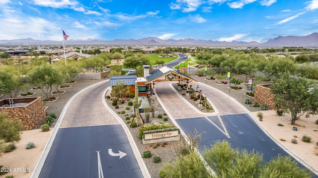 birds eye view of property with a mountain view