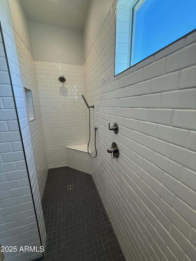 17324 W Royal Palm Rd, Waddell, AZ 85355 - bathroom featuring tiled shower and tile patterned floors