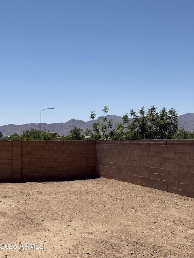 17324 W Royal Palm Rd, Waddell, AZ 85355 - view of yard featuring a mountain view