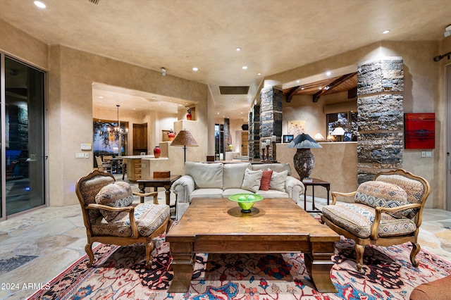 living room with beamed ceiling