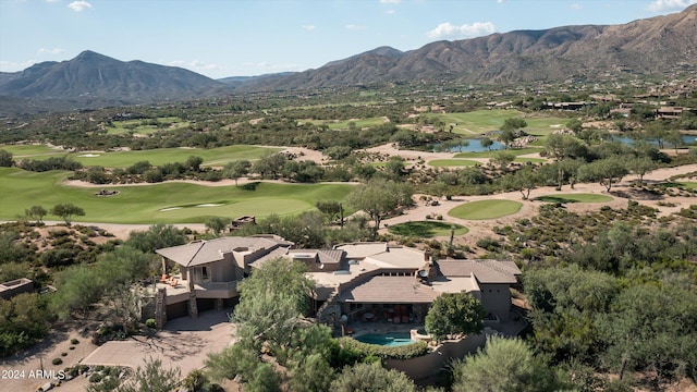 bird's eye view with a water and mountain view