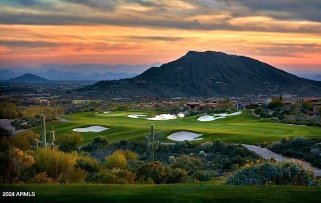 surrounding community with a mountain view