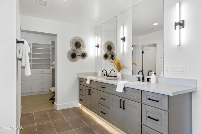 bathroom featuring vanity and hardwood / wood-style flooring