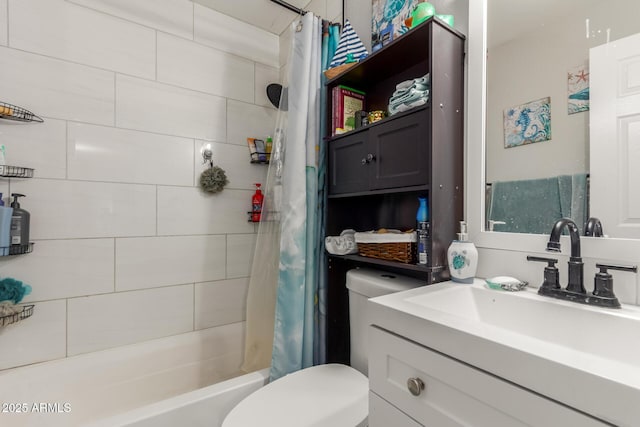 full bathroom with vanity, shower / bath combo, and toilet