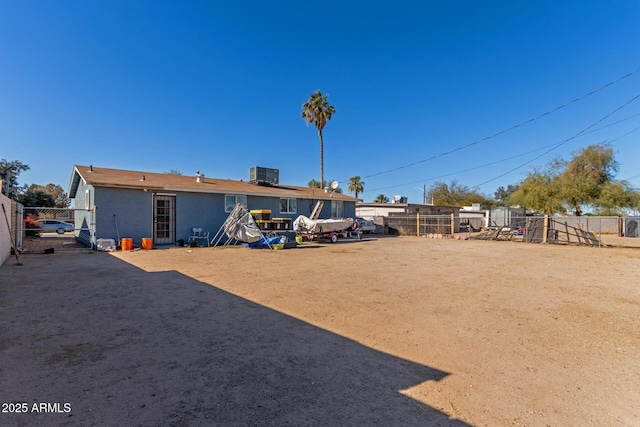 view of yard with central air condition unit