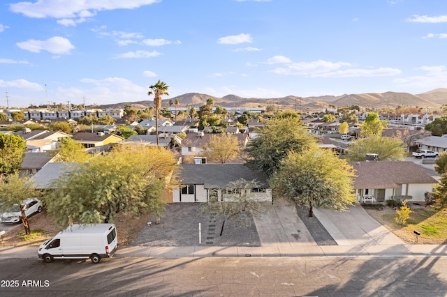 drone / aerial view featuring a mountain view