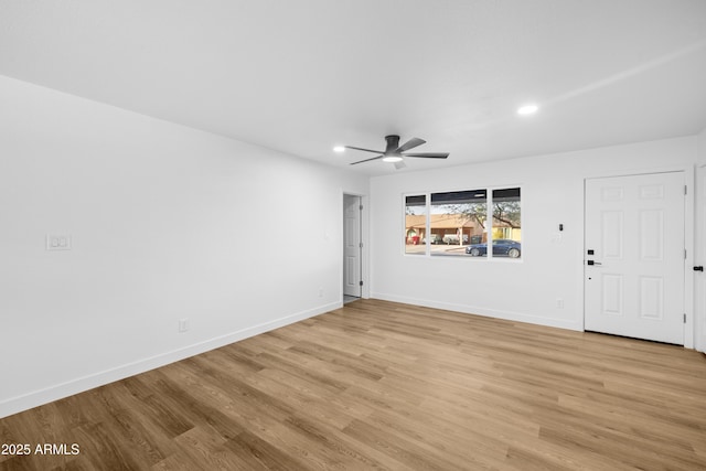 interior space featuring ceiling fan and light hardwood / wood-style flooring