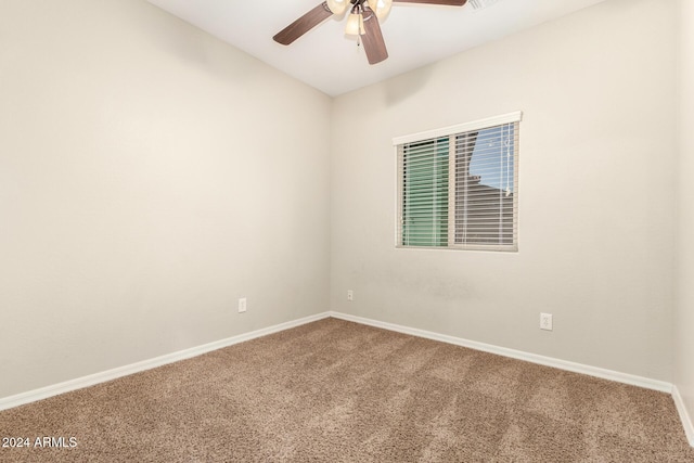 spare room with carpet flooring and ceiling fan