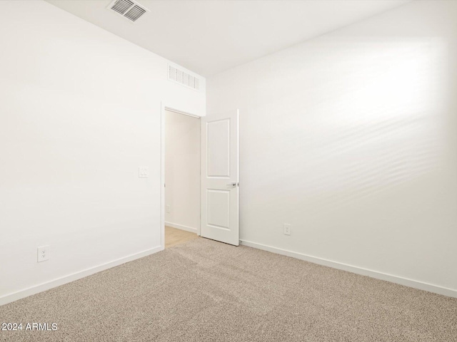 unfurnished room with carpet