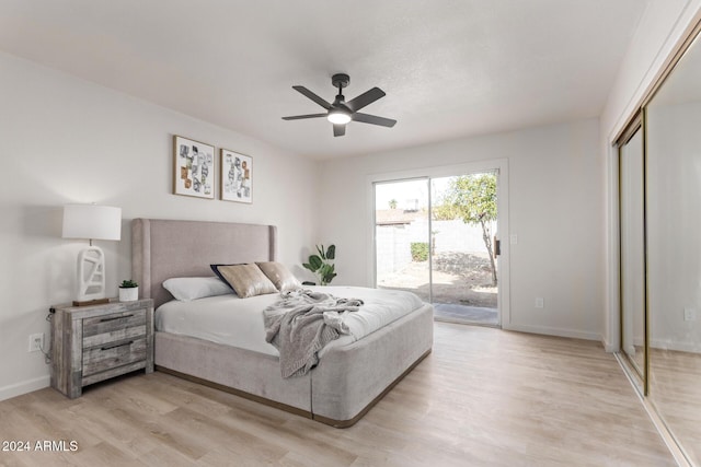 bedroom with access to outside, light hardwood / wood-style floors, a closet, and ceiling fan