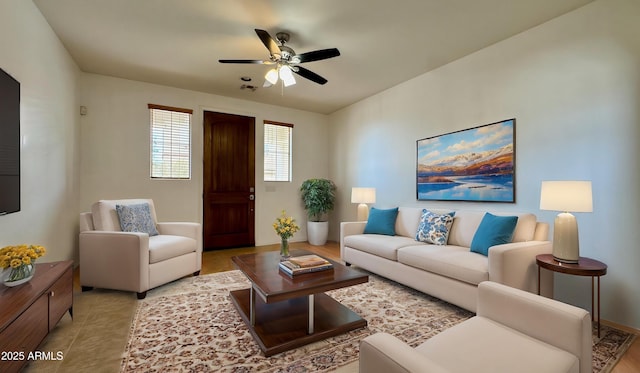 22507 N 31st Ave # 11, Phoenix, AZ 85027 - living area featuring a ceiling fan and baseboards