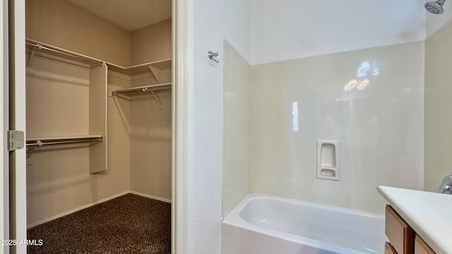 22507 N 31st Ave # 11, Phoenix, AZ 85027 - full bathroom with a spacious closet, vanity, and bathtub / shower combination