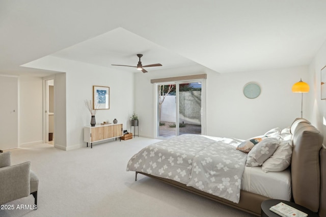 bedroom featuring ceiling fan, light carpet, and access to outside