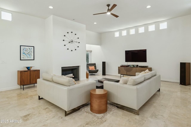 living room featuring ceiling fan