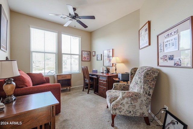 carpeted office with ceiling fan