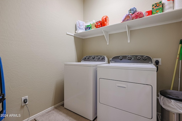 laundry area with washer and clothes dryer