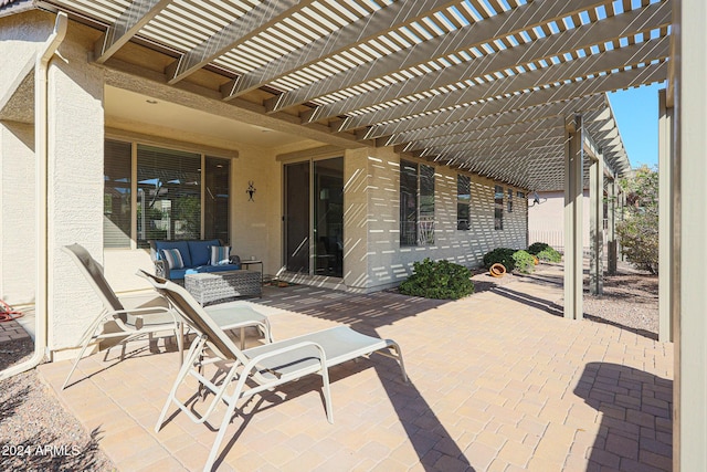 view of patio with a pergola and an outdoor hangout area