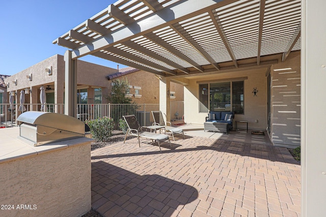 view of patio with a pergola and an outdoor living space