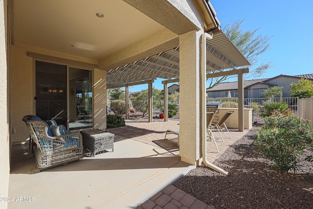 view of patio featuring a pergola