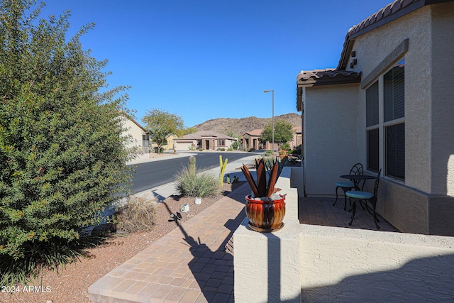 view of patio with a mountain view