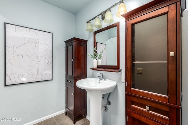 4135 E Altadena Ave, Phoenix, AZ 85028 - bathroom with tile patterned flooring and a sink
