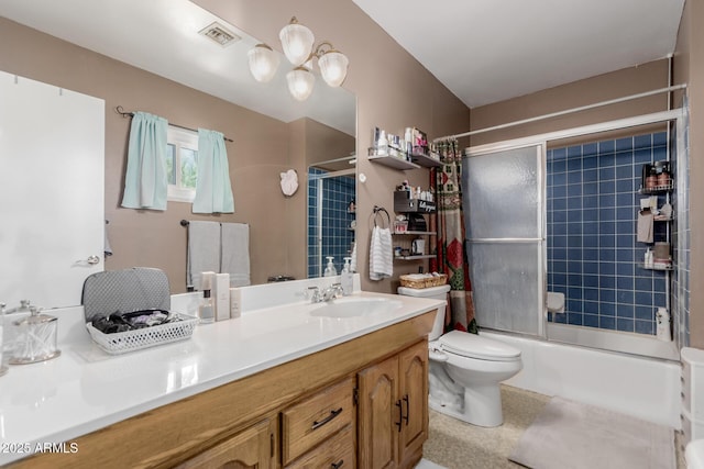 14001 N 34th Dr, Phoenix, AZ 85053 - full bathroom featuring vanity, toilet, and combined bath / shower with glass door