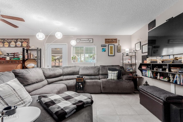 14001 N 34th Dr, Phoenix, AZ 85053 - living area with ceiling fan, a textured ceiling, and light tile patterned flooring