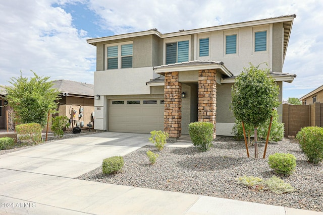 view of front of property with a garage