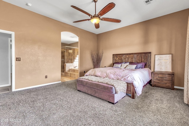 2699 E Claxton Rd, Gilbert, AZ 85297 - bedroom featuring carpet flooring, arched walkways, ensuite bathroom, and a ceiling fan