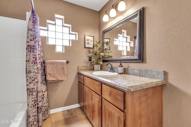 2699 E Claxton Rd, Gilbert, AZ 85297 - full bath featuring vanity, shower / bath combo, and a textured wall