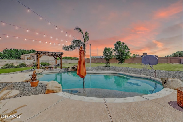 2699 E Claxton Rd, Gilbert, AZ 85297 - pool at dusk with a pergola, a fenced backyard, and a patio