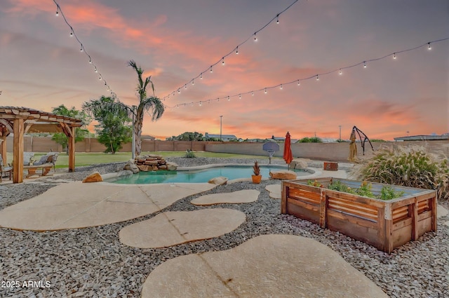 2699 E Claxton Rd, Gilbert, AZ 85297 - pool at dusk with a fenced backyard, a patio, and a pergola