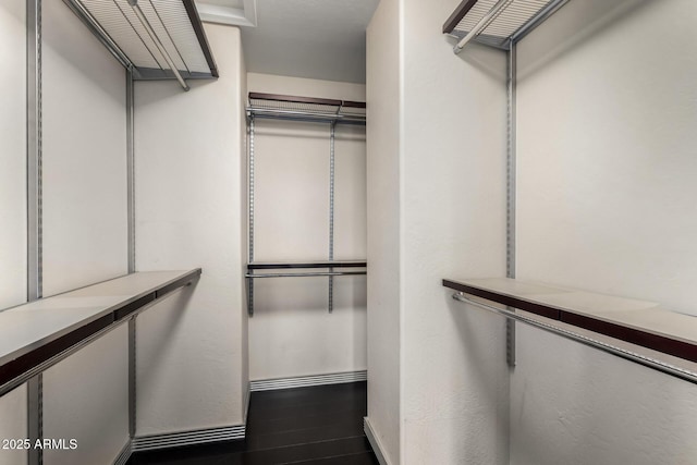 7936 E Wilshire Dr Unit 205, Scottsdale, AZ 85257 - spacious closet with wood finished floors