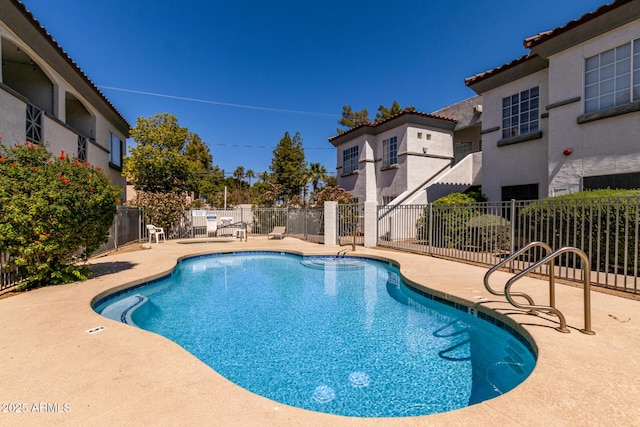 7936 E Wilshire Dr Unit 205, Scottsdale, AZ 85257 - community pool with a patio area and fence
