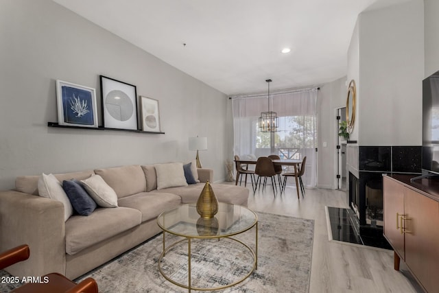 7936 E Wilshire Dr Unit 205, Scottsdale, AZ 85257 - living area featuring recessed lighting, a notable chandelier, and light wood-style floors