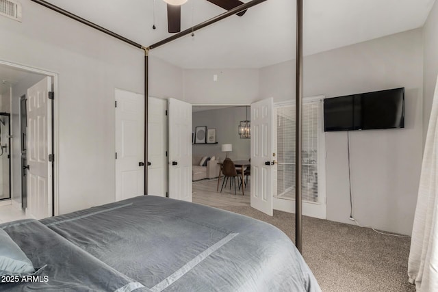 7936 E Wilshire Dr Unit 205, Scottsdale, AZ 85257 - carpeted bedroom with visible vents and a ceiling fan