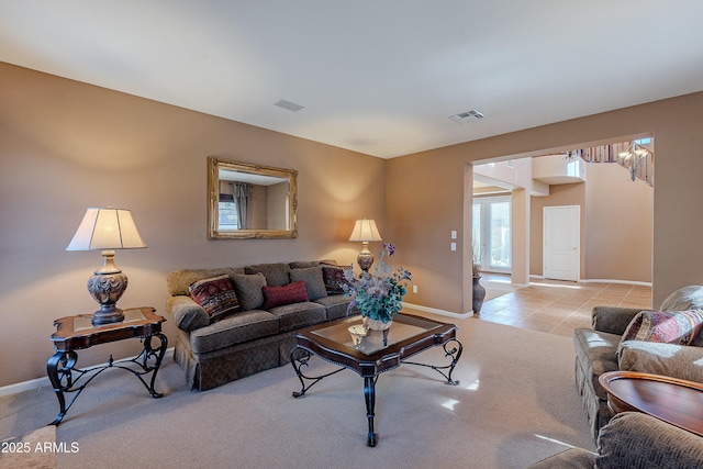 living room featuring light colored carpet