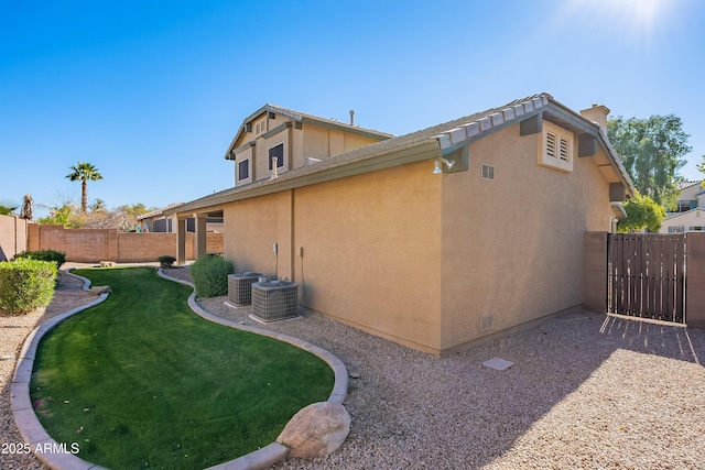 view of property exterior featuring a yard and cooling unit