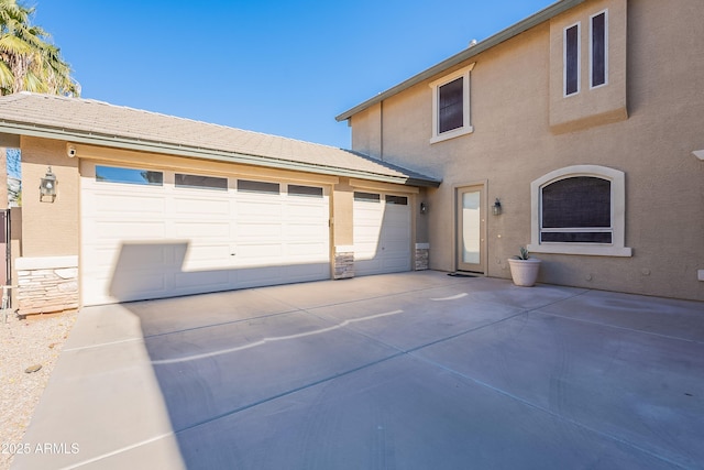 exterior space with a garage