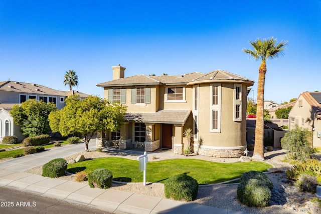 view of front of property with a front yard