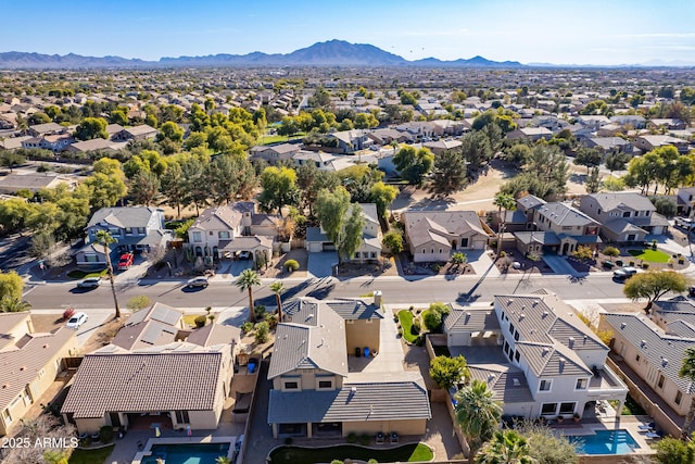 drone / aerial view featuring a mountain view