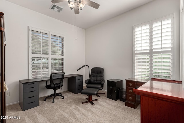 office area with light carpet and ceiling fan