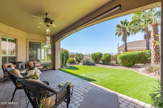 view of patio / terrace featuring ceiling fan