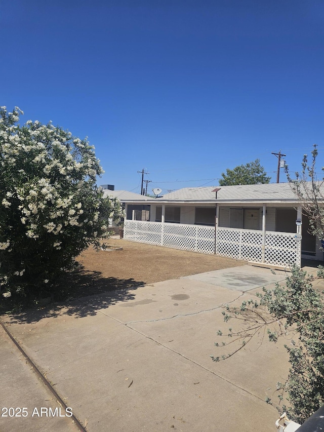 3820 W Encanto Blvd, Phoenix, AZ 85009 - rear view of house featuring covered porch